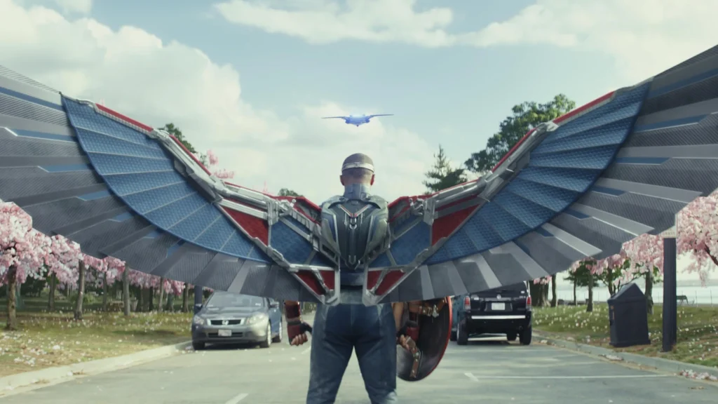 Captain America, Sam Wilson, prepares for combat with wings extended, showcasing determination and readiness.