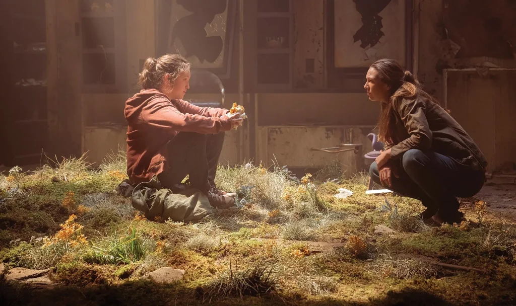 Cover of "The Last of Us," featuring a desolate landscape and characters reflecting themes of despair and survival.