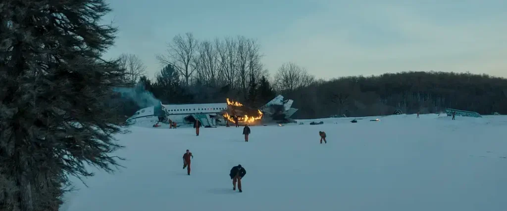 Aerial view of a beautiful snow-covered town, showcasing intricate architecture amidst a serene winter landscape.